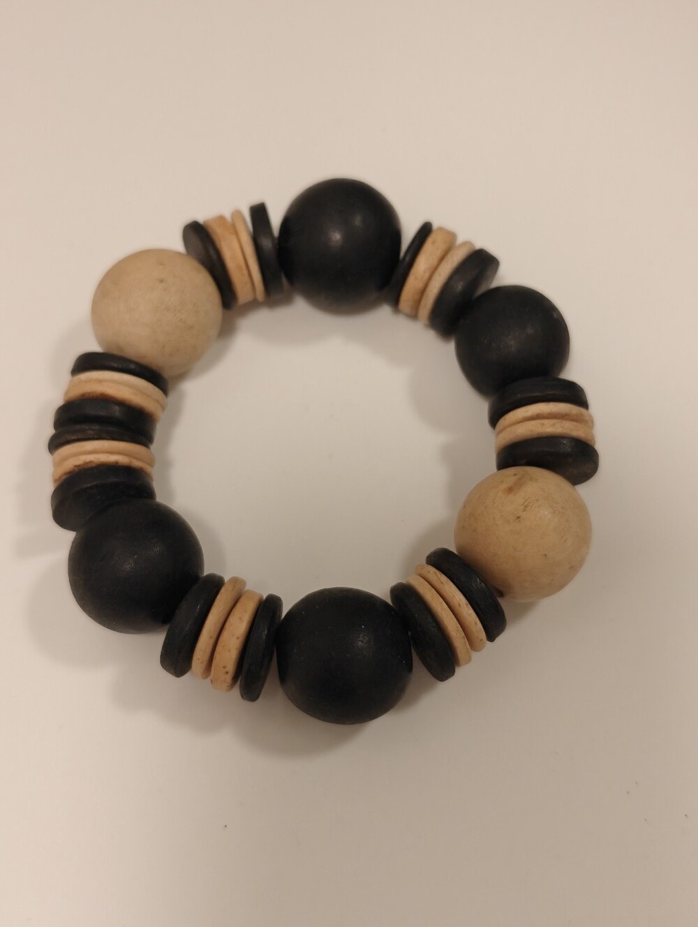 Black and Natural Wood Beaded Stretch Bracelet